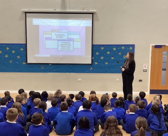 Pupils are pictured gathered in the hall for an assembly on Safer Internet Day 2025.